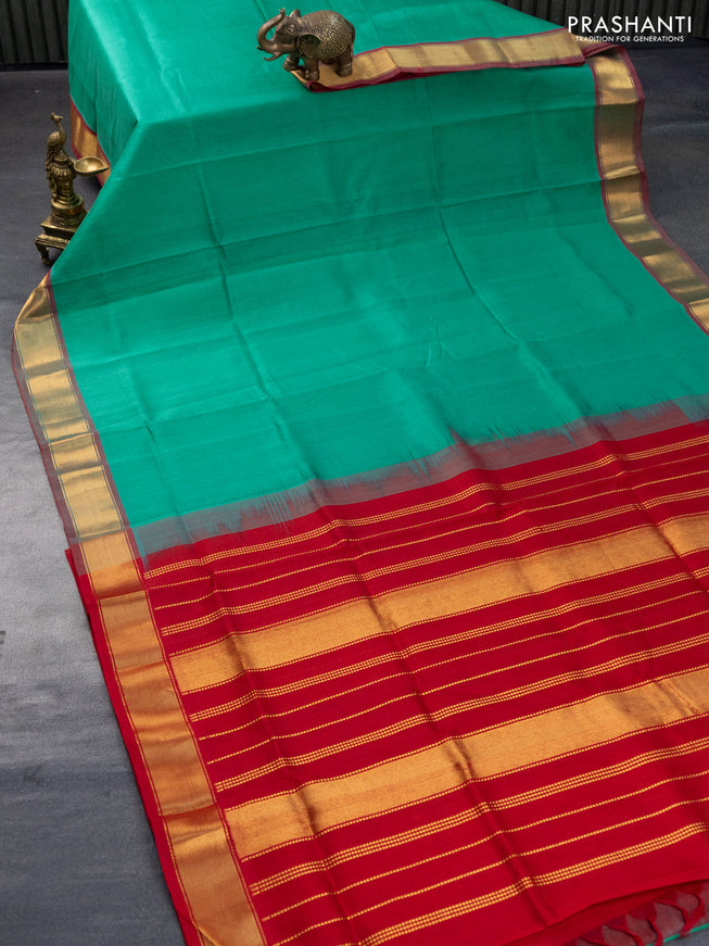 Silk cotton saree teal green and red with plain body and small zari woven border