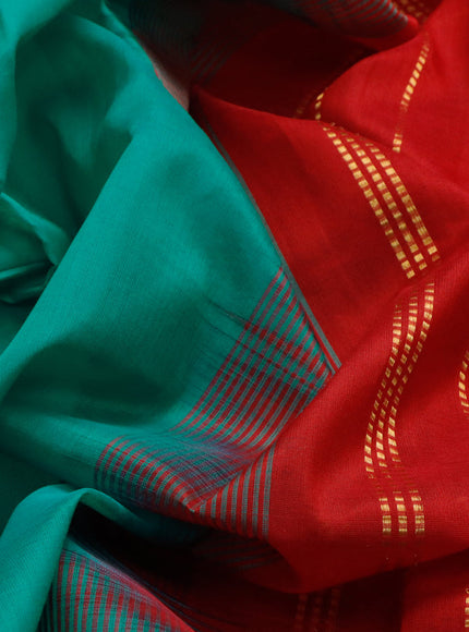 Silk cotton saree teal green and red with plain body and small zari woven border