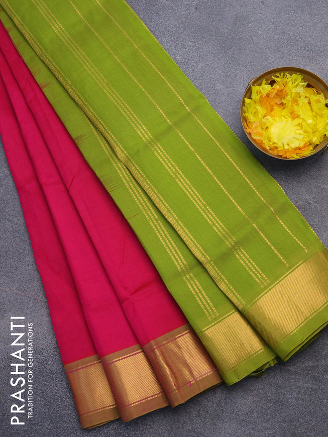 Silk cotton saree pink and light green with plain body and zari woven border