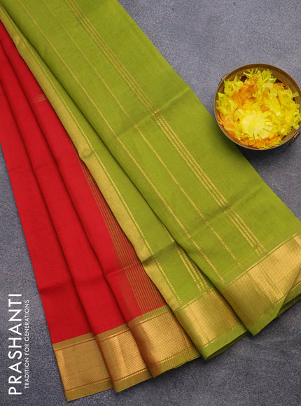 Silk cotton saree red and light green with plain body and zari woven border