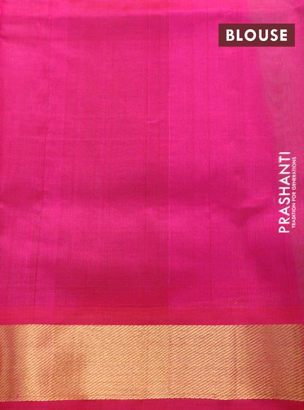 Silk cotton saree green and pink with plain body and zari woven border