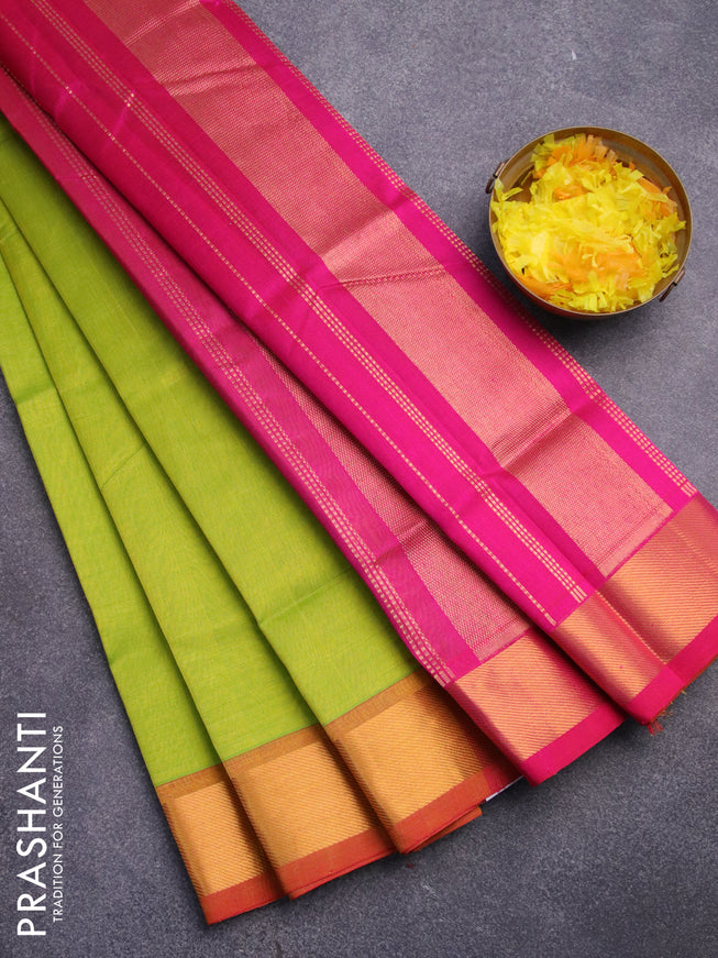 Silk cotton saree light green and pink with plain body and zari woven border