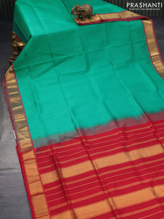 Silk cotton saree teal green and red with plain body and zari woven border