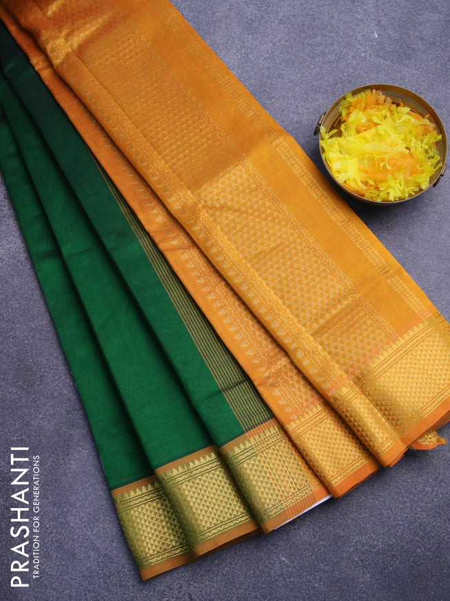 Silk cotton saree green and mustard yellow with plain body and zari woven border