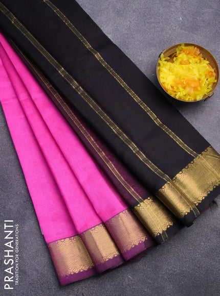 Silk cotton saree candy pink and black with plain body and zari woven border