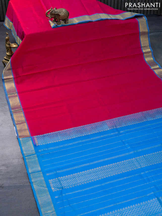 Silk cotton saree pink and cs blue with plain body and zari woven border