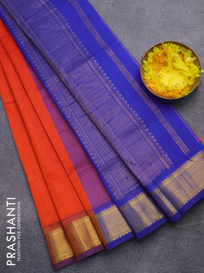 Silk cotton saree orange and blue with plain body and zari woven border