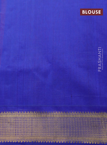 Silk cotton saree orange and blue with plain body and zari woven border