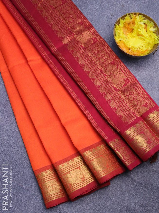 Silk cotton saree orange and maroon with plain body and rich zari woven border