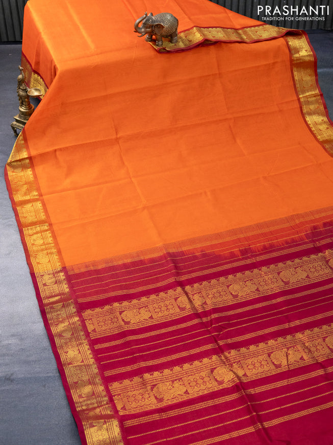 Silk cotton saree orange and maroon with plain body and rich zari woven border