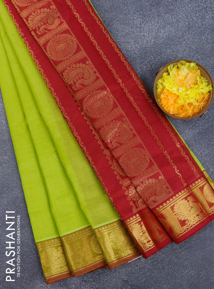 Silk cotton saree light green and maroon with plain body and annam & rudhraksha zari woven border