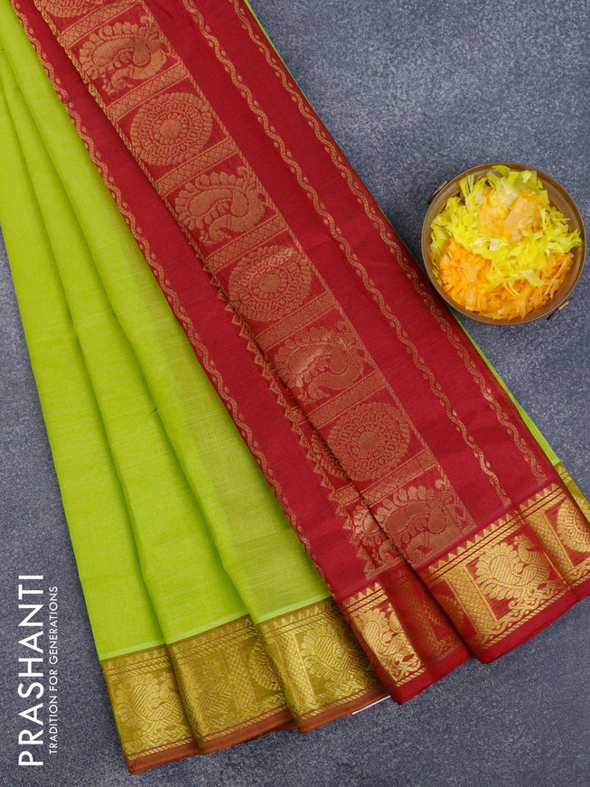 Silk cotton saree light green and maroon with plain body and annam & rudhraksha zari woven border