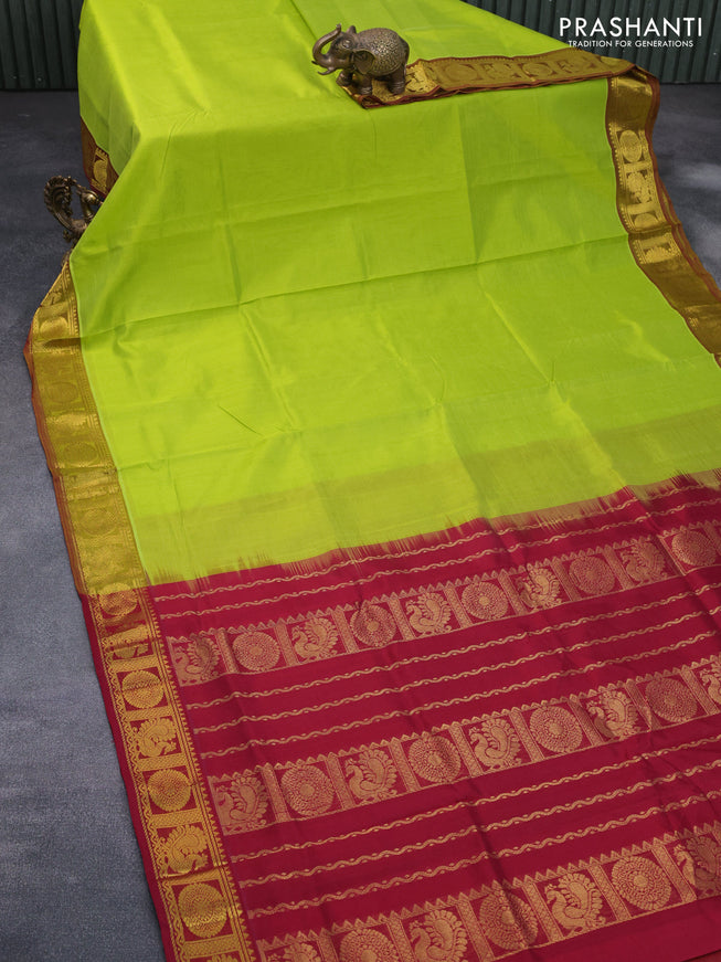 Silk cotton saree light green and maroon with plain body and annam & rudhraksha zari woven border