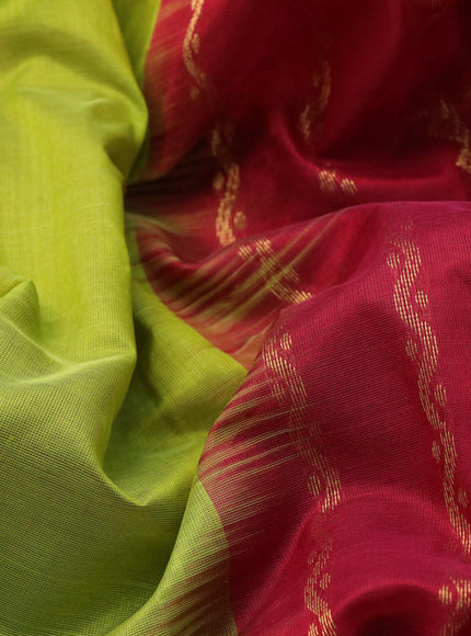 Silk cotton saree light green and maroon with plain body and annam & rudhraksha zari woven border