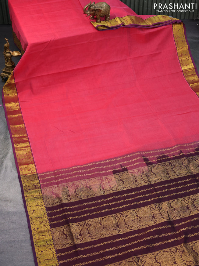 Silk cotton saree reddish pink and brown with plain body and annam zari woven border