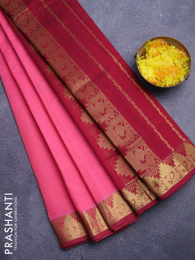 Silk cotton saree pink shade and maroon with plain body and temple design zari woven border