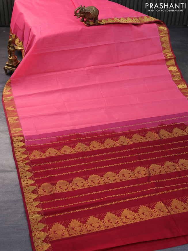 Silk cotton saree pink shade and maroon with plain body and temple design zari woven border