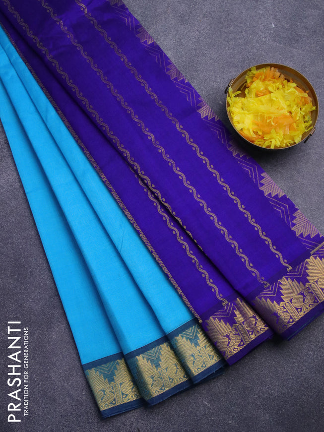 Silk cotton saree light blue and blue with plain body and temple design zari woven border