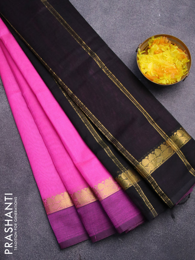 Silk cotton saree pink and black with plain body and zari woven simple border