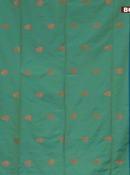 Semi soft silk saree dual shade of green and dual shade of bluish green with copper zari woven buttas and zari woven butta border