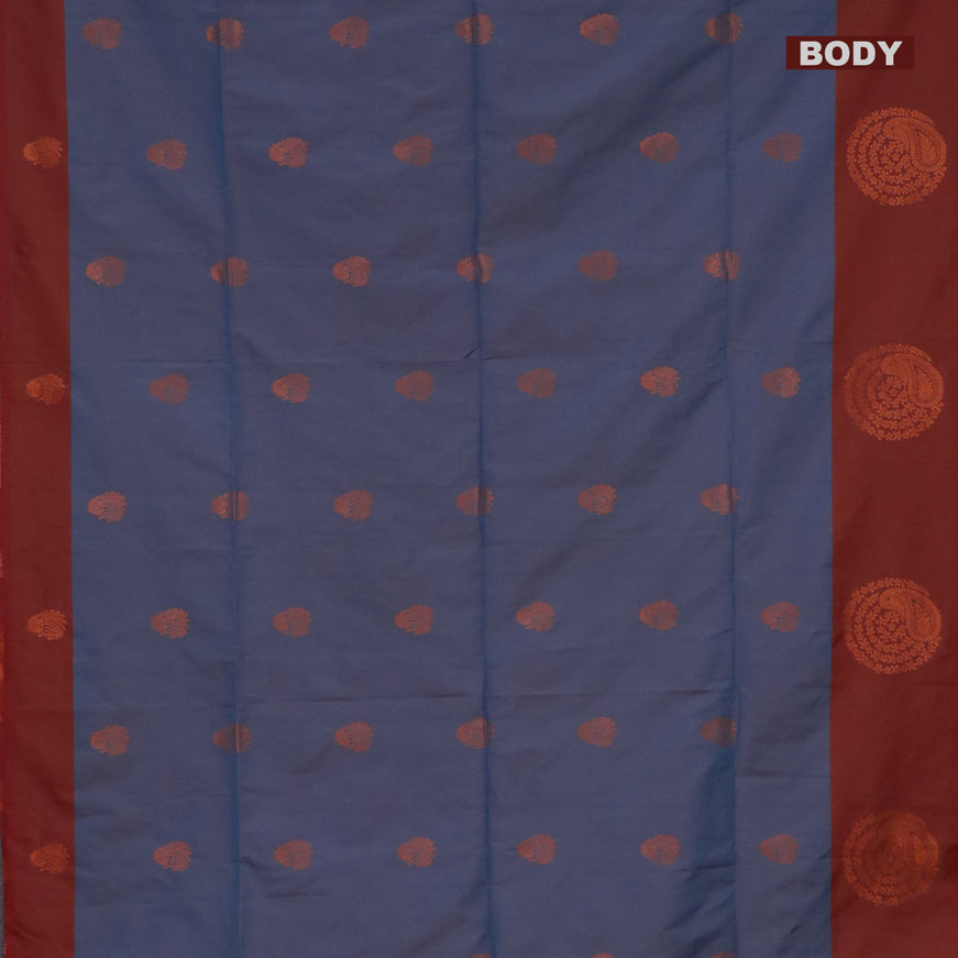 Semi soft silk saree dual shade of blue and dual shade of rust with copper zari woven buttas and zari woven butta border