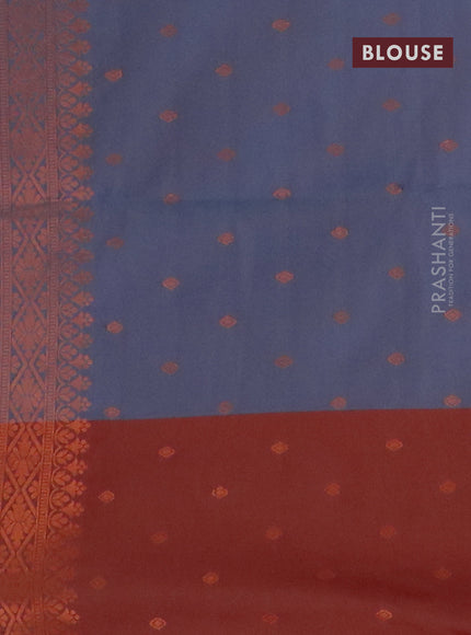 Semi soft silk saree dual shade of blue and dual shade of rust with copper zari woven buttas and zari woven butta border