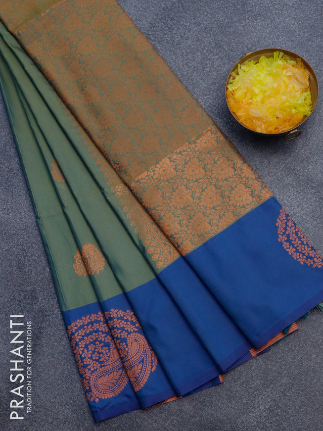 Semi soft silk saree dual shade of green and dual shade of blue with copper zari woven buttas and zari woven butta border