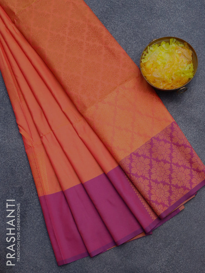 Semi soft silk saree dual shade of pinkish orange and purple with copper zari woven box type buttas and simple border