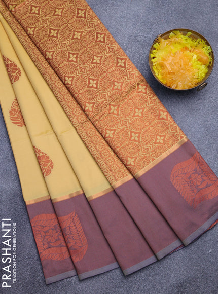 Semi soft silk saree yellow and grey shade with thread & zari woven buttas and zari woven butta border