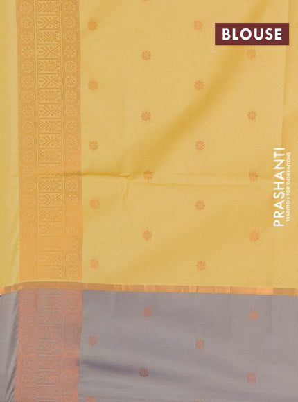 Semi soft silk saree yellow and grey shade with thread & zari woven buttas and zari woven butta border