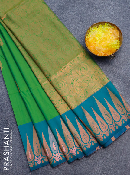 Semi soft silk saree green and peacock green with copper zari woven buttas and zari woven border