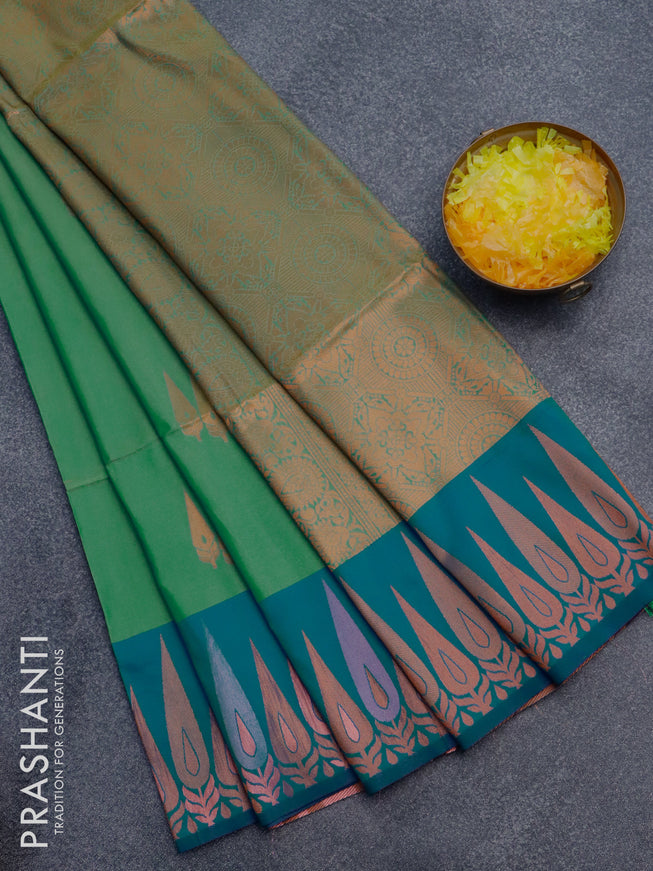 Semi soft silk saree dual shade of green and dual shade of blue with copper zari woven buttas and zari woven border