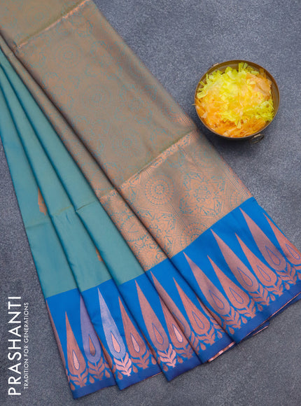 Semi soft silk saree dual shade of teal bluish green and blue with copper zari woven buttas and zari woven border