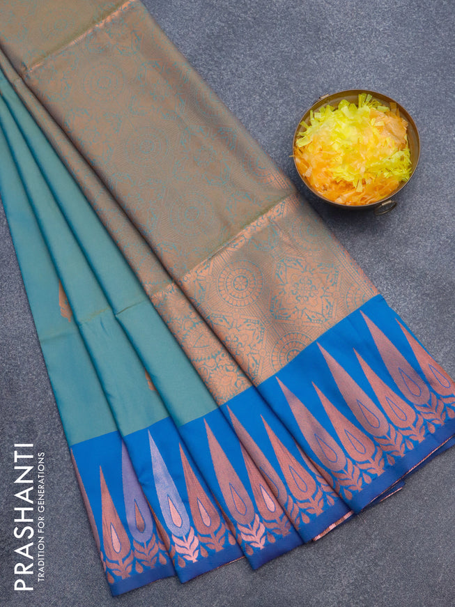 Semi soft silk saree dual shade of teal bluish green and blue with copper zari woven buttas and zari woven border