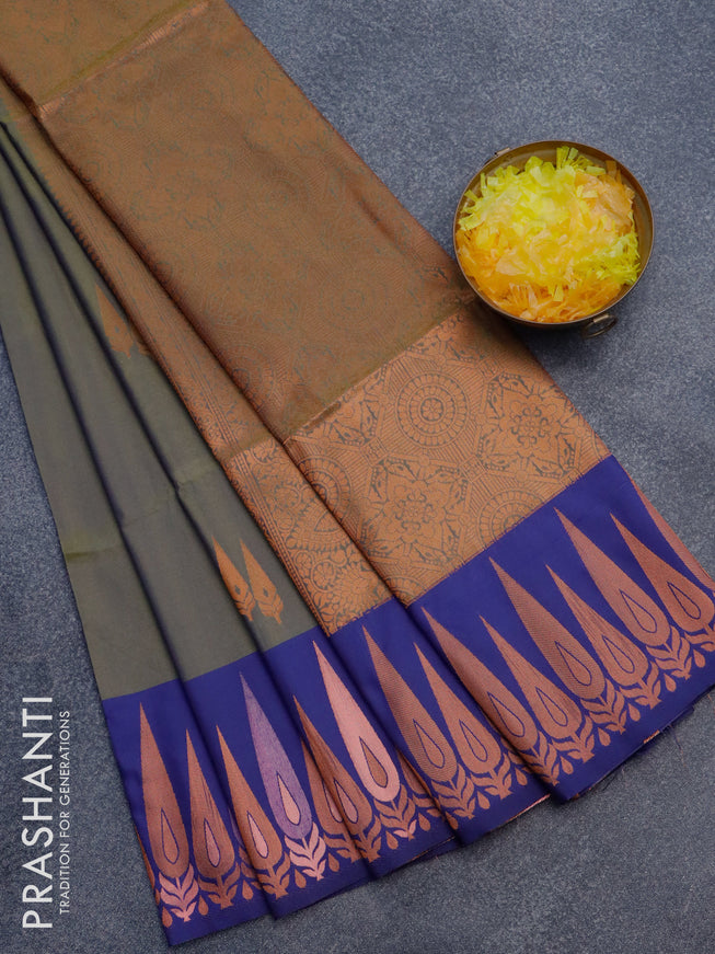 Semi soft silk saree dual shade of olive green and blue with copper zari woven buttas and zari woven border