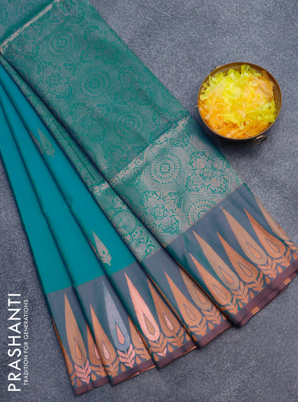 Semi soft silk saree teal blue and dual shade of bluish maroon with copper zari woven buttas and zari woven border