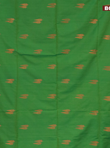 Semi soft silk saree green and peacock green with copper zari woven buttas and zari woven border