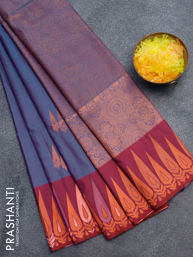 Semi soft silk saree dual shade of bluish purple and maroon with copper zari woven buttas and zari woven border