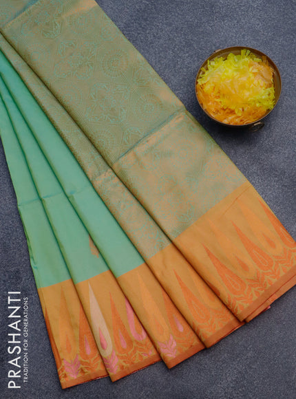 Semi soft silk saree teal green shade and mustard yellow with copper zari woven buttas and zari woven border