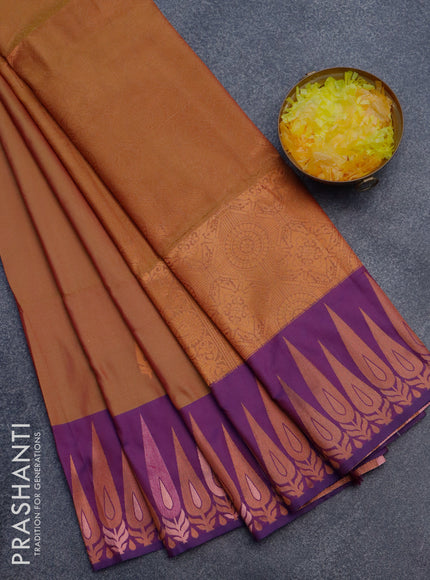 Semi soft silk saree dual shade of mustard yellowish pink and purple with copper zari woven buttas and zari woven border