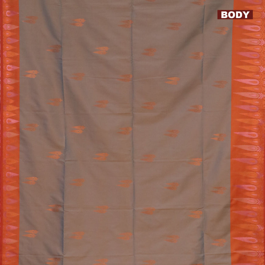 Semi soft silk saree dual shade of bluish beige and rustic orange with copper zari woven buttas and zari woven border