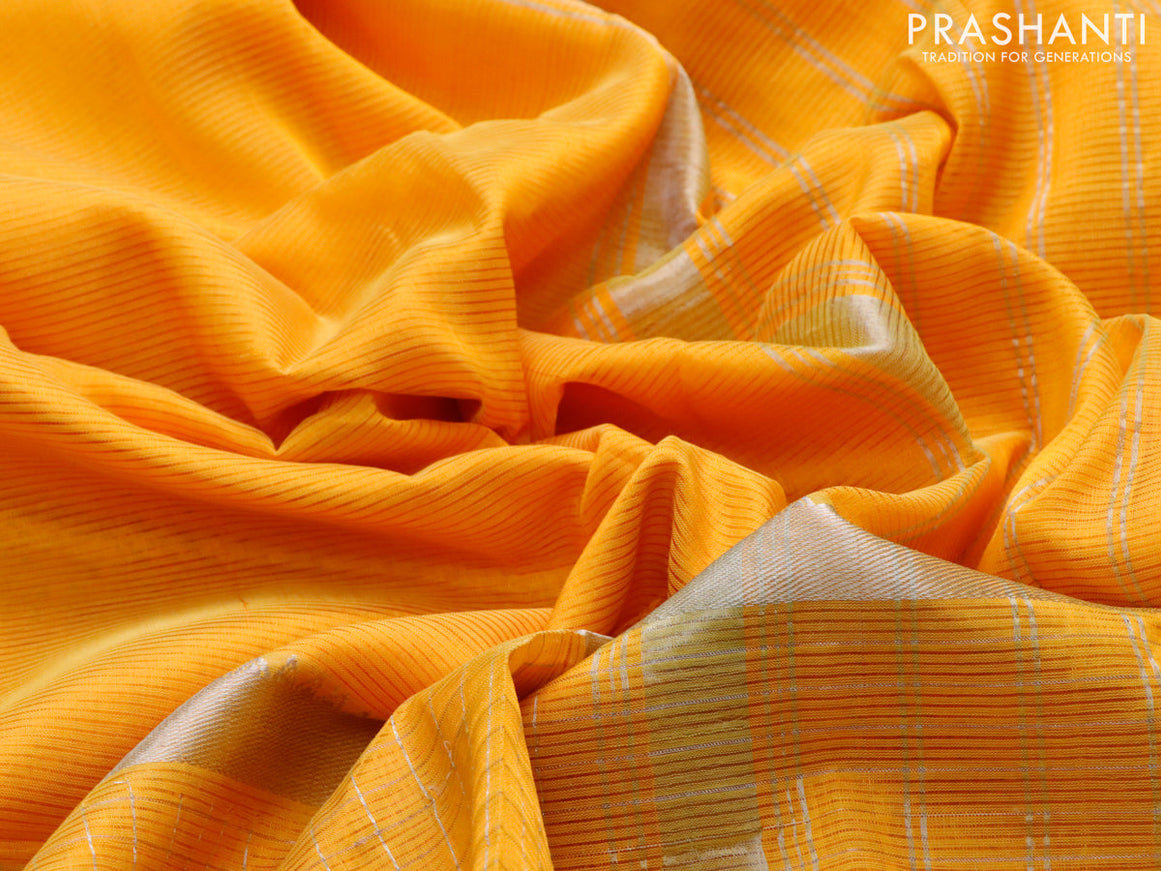 Mangalgiri silk cotton saree mango yellow with plain body and silver zari woven border