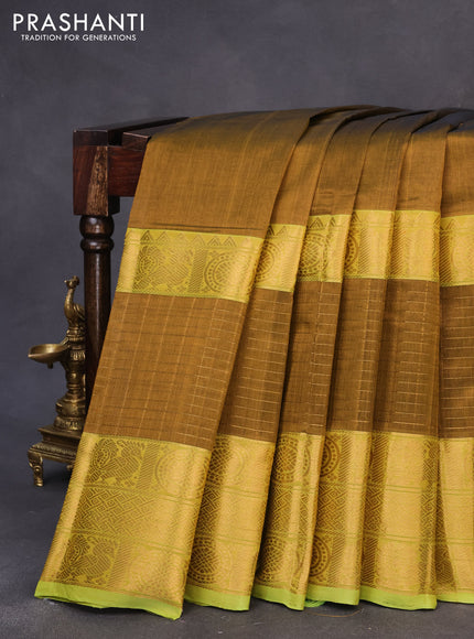 Mangalgiri silk cotton saree honey shade and light green with plain body and zari woven border