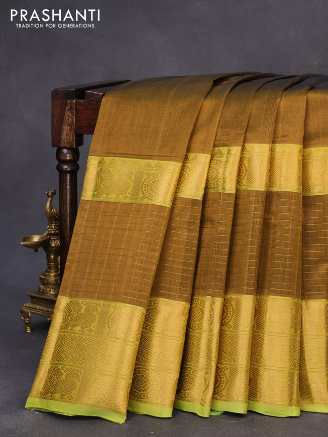 Mangalgiri silk cotton saree honey shade and light green with plain body and zari woven border