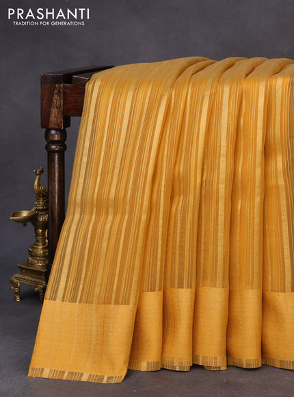 Organza saree mustard yellow with allover zari weaves and simple border