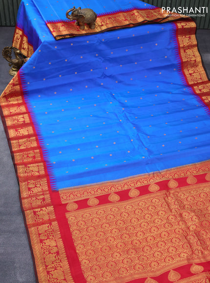 Pure gadwal silk saree blue and red with zari woven buttas and rich zari woven border