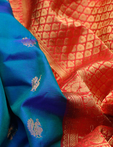 Pure gadwal silk saree dual shade of teal bluish green and red with zari woven buttas and temple design zari border