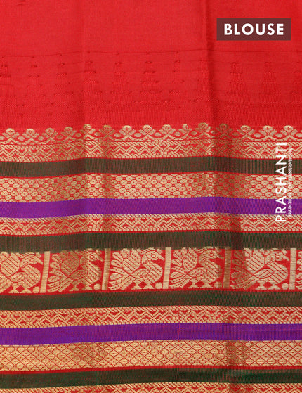 Pure gadwal silk saree dual shade of teal bluish green and red with zari woven buttas and temple design zari border