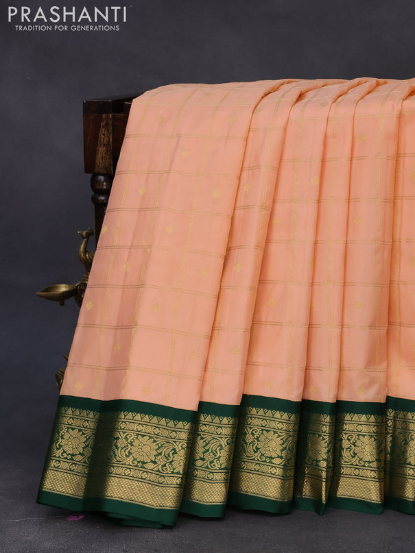 Pure gadwal silk saree pastel peach and green with allover zari checked pattern & zari buttas and zari woven border