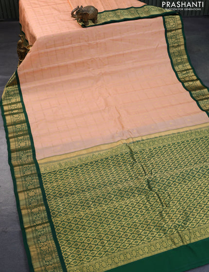 Pure gadwal silk saree pastel peach and green with allover zari checked pattern & zari buttas and zari woven border